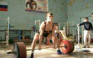 Почему болит поясница после приседаний со штангой?